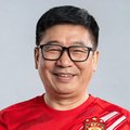 球迷老张头像，戴着眼镜微笑